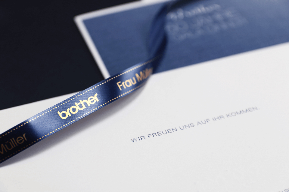 Brother Schriftband TZe-RN34 | 12 mm | Gold auf Blau | 4 m